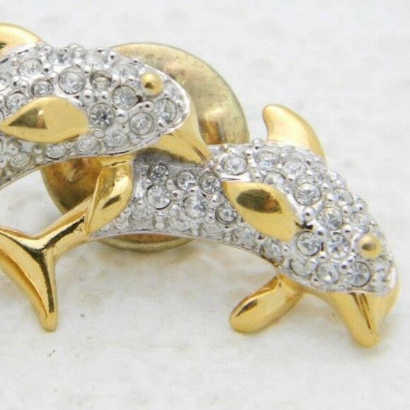 SWAROVSKI Signed Gold Tone Clear Rhinestone Pin